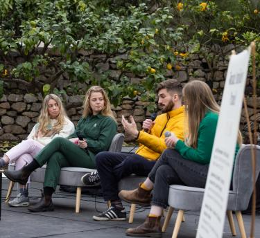 Reclaim 2023 Climate Anxiety Q&A Panel, speakers on a stage